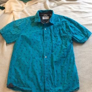 Nautical button down casual shortsleeved shirt.